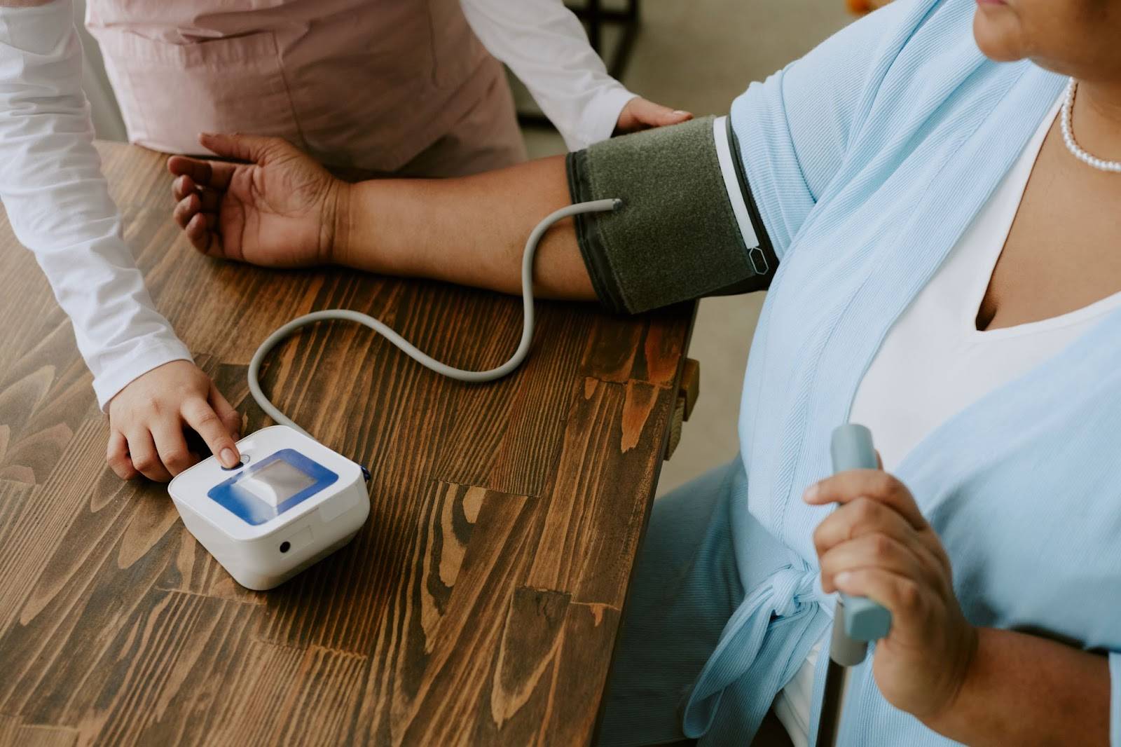 Doctor checking Blood Pressure