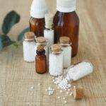 Homeopathic pills containers on a table